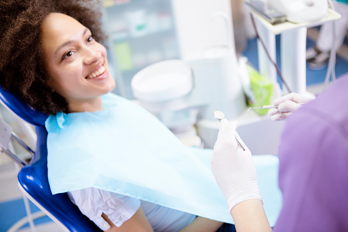 Woman getting a dental checkup.